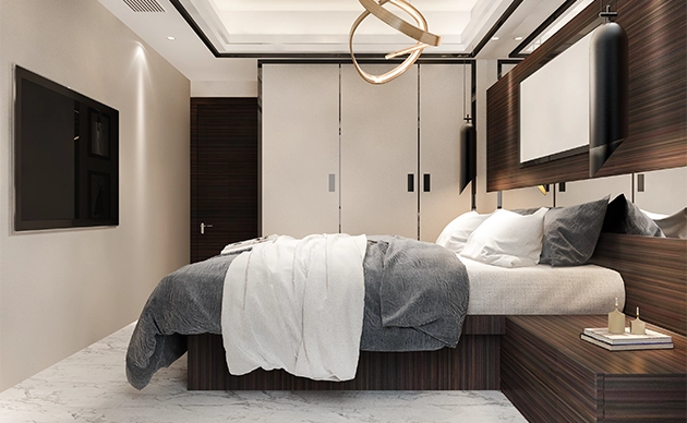 Wide view of luxury bedroom featuring sitting area and large windows